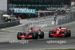 08.04.2007 Kuala Lumpur, Malaysia,  Lewis Hamilton (GBR), McLaren Mercedes, MP4-22 and Felipe Massa (BRA), Scuderia Ferrari, F2007 - Formula 1 World Championship, Rd 2, Malaysian Grand Prix, Sunday Race