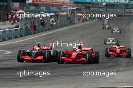 08.04.2007 Kuala Lumpur, Malaysia,  Lewis Hamilton (GBR), McLaren Mercedes, MP4-22 and Felipe Massa (BRA), Scuderia Ferrari, F2007 - Formula 1 World Championship, Rd 2, Malaysian Grand Prix, Sunday Race