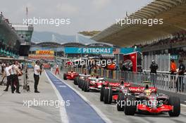 07.04.2007 Kuala Lumpur, Malaysia,  Lewis Hamilton (GBR), McLaren Mercedes, MP4-22 and Fernando Alonso (ESP), McLaren Mercedes, MP4-22 - Formula 1 World Championship, Rd 2, Malaysian Grand Prix, Saturday Qualifying