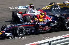 26.08.2007 Istanbul, Turkey,  Mark Webber (AUS), Red Bull Racing, RB3 as Jarno Trulli (ITA), Toyota Racing, TF107 is sideways - Formula 1 World Championship, Rd 12, Turkish Grand Prix, Sunday Race