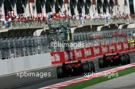 26.08.2007 Istanbul, Turkey,  Felipe Massa (BRA), Scuderia Ferrari, F2007 and Kimi Raikkonen (FIN), Räikkönen, Scuderia Ferrari, F2007 - Formula 1 World Championship, Rd 12, Turkish Grand Prix, Sunday Race