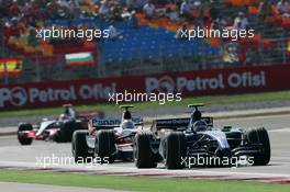 26.08.2007 Istanbul, Turkey,  Rubens Barrichello (BRA), Honda Racing F1 Team, RA107 and Jarno Trulli (ITA), Toyota Racing, TF107 - Formula 1 World Championship, Rd 12, Turkish Grand Prix, Sunday Race