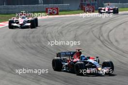 26.08.2007 Istanbul, Turkey,  Vitantonio Liuzzi (ITA), Scuderia Toro Rosso, STR02, Anthony Davidson (GBR), Super Aguri F1 Team, SA07 - Formula 1 World Championship, Rd 12, Turkish Grand Prix, Sunday Race