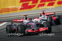 26.08.2007 Istanbul, Turkey,  Fernando Alonso (ESP), McLaren Mercedes, MP4-22 and Takuma Sato (JPN), Super Aguri F1, SA07 - Formula 1 World Championship, Rd 12, Turkish Grand Prix, Sunday Race