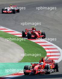 26.08.2007 Istanbul, Turkey,  Felipe Massa (BRA), Scuderia Ferrari, F2007 leads Kimi Raikkonen (FIN), Räikkönen, Scuderia Ferrari, F2007 and Lewis Hamilton (GBR), McLaren Mercedes, MP4-22 - Formula 1 World Championship, Rd 12, Turkish Grand Prix, Sunday Race