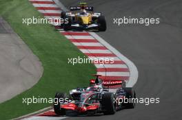 26.08.2007 Istanbul, Turkey,  Fernando Alonso (ESP), McLaren Mercedes, MP4-22 and Heikki Kovalainen (FIN), Renault F1 Team, R27 - Formula 1 World Championship, Rd 12, Turkish Grand Prix, Sunday Race