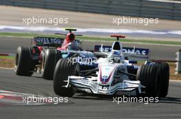 26.08.2007 Istanbul, Turkey,  Nick Heidfeld (GER), BMW Sauber F1 Team, F1.07, Sebastian Vettel (GER), Scuderia Toro Rosso, STR02  - Formula 1 World Championship, Rd 12, Turkish Grand Prix, Sunday Race