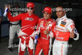 25.08.2007 Istanbul, Turkey,  Kimi Raikkonen (FIN), Räikkönen, Scuderia Ferrari with pole position sitter Felipe Massa (BRA), Scuderia Ferrari and Lewis Hamilton (GBR), McLaren Mercedes - Formula 1 World Championship, Rd 12, Turkish Grand Prix, Saturday Qualifying