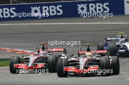 17.06.2007 Indianapolis, USA,  Fernando Alonso (ESP), McLaren Mercedes, MP4-22 and Lewis Hamilton (GBR), McLaren Mercedes, MP4-22 - Formula 1 World Championship, Rd 7, United States Grand Prix, Sunday Race