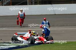 17.06.2007 Indianapolis, USA,  Ralf Schumacher (GER), Toyota Racing, TF107 stopped on first corner after a crash - Formula 1 World Championship, Rd 7, United States Grand Prix, Sunday Race