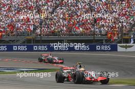 17.06.2007 Indianapolis, USA,  Lewis Hamilton (GBR), McLaren Mercedes, MP4-22 leads Fernando Alonso (ESP), McLaren Mercedes, MP4-22 - Formula 1 World Championship, Rd 7, United States Grand Prix, Sunday Race