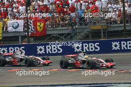 17.06.2007 Indianapolis, USA,  Fernando Alonso (ESP), McLaren Mercedes, MP4-22 and Lewis Hamilton (GBR), McLaren Mercedes, MP4-22 - Formula 1 World Championship, Rd 7, United States Grand Prix, Sunday Race