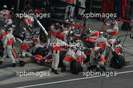 17.06.2007 Indianapolis, USA,  Fernando Alonso (ESP), McLaren Mercedes, MP4-22 pit stop - Formula 1 World Championship, Rd 7, United States Grand Prix, Sunday Race