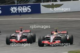 17.06.2007 Indianapolis, USA,  Fernando Alonso (ESP), McLaren Mercedes, MP4-22 and Lewis Hamilton (GBR), McLaren Mercedes, MP4-22 - Formula 1 World Championship, Rd 7, United States Grand Prix, Sunday Race