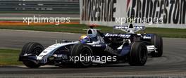 17.06.2007 Indianapolis, USA,  Nico Rosberg (GER), WilliamsF1 Team, FW29 and Sebastian Vettel (GER), Test Driver, BMW Sauber F1 Team, F1.07  - Formula 1 World Championship, Rd 7, United States Grand Prix, Sunday Race
