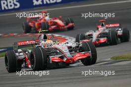 17.06.2007 Indianapolis, USA,  Lewis Hamilton (GBR), McLaren Mercedes, MP4-22, Fernando Alonso (ESP), McLaren Mercedes, Felipe Massa (BRA), Scuderia Ferrari, F2007 - Formula 1 World Championship, Rd 7, United States Grand Prix, Sunday Race