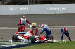 17.06.2007 Indianapolis, USA,  Ralf Schumacher (GER), Toyota Racing, TF107 stopped on first corner after a crash - Formula 1 World Championship, Rd 7, United States Grand Prix, Sunday Race