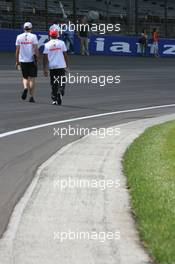 14.06.2007 Indianapolis, USA,  Lewis Hamilton (GBR), McLaren Mercedes, walks around the circuit banking - Formula 1 World Championship, Rd 7, United States Grand Prix, Thursday