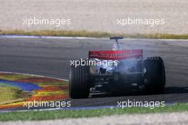 17.01.2007 Valencia, Spain,  Fernando Alonso (ESP), McLaren Mercedes in the new MP4-22 on track with engine problem  - Formula 1 Testing