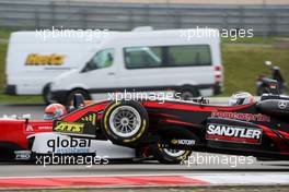 01.09.2007 Nürburg, Germany,  In the first corner Franck Mailleux (FRA), Manor Motorsport, Dallara F305 Mercedes and Tim Sandtler (GER), Jo Zeller Racing, Dallara F306 Mercedes touches eachother. Tim Sandtler lifts off with his F3 into the air. - F3 Euro Series 2007 at Nürburgring