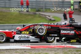 01.09.2007 Nürburg, Germany,  In the first corner Franck Mailleux (FRA), Manor Motorsport, Dallara F305 Mercedes and Tim Sandtler (GER), Jo Zeller Racing, Dallara F306 Mercedes touches eachother. Tim Sandtler lifts off with his F3 into the air. - F3 Euro Series 2007 at Nürburgring