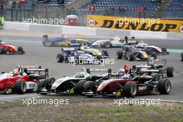 01.09.2007 Nürburg, Germany,  In the first corner Franck Mailleux (FRA), Manor Motorsport, Dallara F305 Mercedes and Tim Sandtler (GER), Jo Zeller Racing, Dallara F306 Mercedes touches eachother. Tim Sandtler lifts off with his F3 into the air. - F3 Euro Series 2007 at Nürburgring