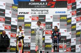 02.09.2007 Nürburg, Germany,  Podium, Harald Schlegelmilch (LVA), HS Technik, Portrait (1st, center), Romain Grosjean (FRA), ASM Formula 3, Portrait (2nd, left), Sébastien Buemi (SUI), ASL Mücke Motorsport, Portrait (3rd, right) - F3 Euro Series 2007 at Nürburgring