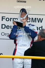 06.05.2007 Oschersleben, Germany,  Podium, Jens Klingmann (GER), Eifelland Racing, Portrait (1st), kissing the winners trophy - Formula BMW Germany Championship 2007, Round 1 & 2, Motorsport Arena Oschersleben, 2nd Race - For further information and more images please register at www.formulabmw-images.com - This image is free for editorial use only. Please use for Copyright/Credit: c BMW AG
