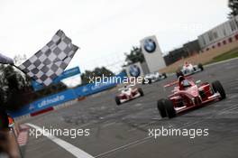 02.09.2007 Nürburg, Germany,  Marco Wittmann (GER), Josef Kaufmann Racing crosses the checkered flag. - Formula BMW Germany Championship 2007, Round 13 & 14, Nürburgring, 2nd Race - For further information and more images please register at www.formulabmw-images.com - This image is free for editorial use only. Please use for Copyright/Credit: c BMW AG