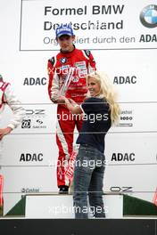 02.09.2007 Nürburg, Germany,  Racewinner Marco Wittmann (GER), Josef Kaufmann Racing receives the trophy by Miss Nord Germany Hiltja Müller (GER). - Formula BMW Germany Championship 2007, Round 13 & 14, Nürburgring, 2nd Race - For further information and more images please register at www.formulabmw-images.com - This image is free for editorial use only. Please use for Copyright/Credit: c BMW AG