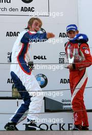 23.09.2007 Barcelona, Spain,  Racewinner Jens Klingmann (GER), Eifelland Racing throws away his cap. Marco Wittmann (GER), Josef Kaufmann Racing watches. - Formula BMW Germany Championship 2007, Round 15 & 16, Circuit de Catalunya, 2nd Race - For further information and more images please register at www.formulabmw-images.com - This image is free for editorial use only. Please use for Copyright/Credit: c BMW AG