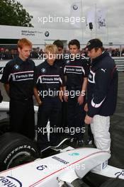 06.07.2007 Silverstone, England,  Nigel Mansell (GBR) with Formula BMW Drivers - BMW Pitlane Park at the British Grand Prix - For further information and more images please register at www.formulabmw-images.com - This image is free for editorial use only. Please use for Copyright/Credit: c BMW AG