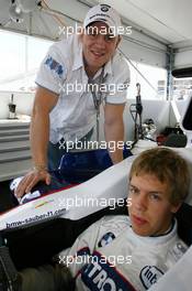 08.07.2007 Silverstone, England,  England Rugby World Cup Winner Mike Tindall (GBR), visits the BMW Sauber F1 Team Pit Lane Park and meets Sebastian Vettel (GER), Test Driver, BMW Sauber F1 Team ahead of todays British Grand Prix - BMW Pitlane Park at the British Grand Prix - For further information and more images please register at www.formulabmw-images.com - This image is free for editorial use only. Please use for Copyright/Credit: c BMW AG