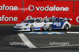 06.05.2007 Oschersleben, Germany,  Tuff Duell between Richard Westbrook (GBR), ARAXA Racing PZ Reutlingen, Porsche 911 GT3 Cup and Uwe Alzen (GER), HP Team Herberth, Porsche 911 GT3 Cup - Porsche Carrera Cup 2007 at Motorsport Arena Oschersleben