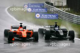 05.10.2008 Zandvoort, The Netherlands,  Jeroen Bleekemolen (NED), driver of A1 Team Netherlands and Earl Bamber (NZL), driver of A1 Team New Zealand side-by-side fighting for the lead of the race - A1GP World Cup of Motorsport 2008/09, Round 1, Zandvoort, Sunday Race 1 - Copyright A1GP - Free for editorial usage