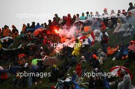 05.10.2008 Zandvoort, The Netherlands,  Fans light fireworks before the start of the race - A1GP World Cup of Motorsport 2008/09, Round 1, Zandvoort, Sunday - Copyright A1GP - Free for editorial usage
