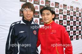 06.11.2008 Chengdu, China,  Li Tie (CHN) ex Everton football player now current Chengdu Blades player with Ho Pin Tung (CHN), driver of A1 Team China at the Chengdu Blades training ground for a friendly football match - A1GP World Cup of Motorsport 2008/09, Round 2, Chengdu, Thursday - Copyright A1GP - Free for editorial usage