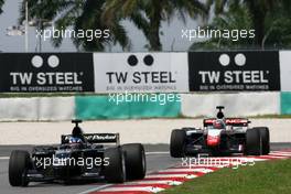23.11.2008 Kuala Lumpur, Malaysia,  Earl Bamber (NZL), driver of A1 Team New Zealand, Loic Duval (FRA), driver of A1 Team France  - A1GP World Cup of Motorsport 2008/09, Round 3, Sepang, Sunday Race 1 - Copyright A1GP - Free for editorial usage