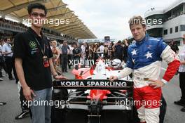 23.11.2008 Kuala Lumpur, Malaysia,  Jung-Yong Joshua Kim (KOR) Seat Holder of A1 Team Korea and Marco Andretti (USA), driver of A1 Team USA - A1GP World Cup of Motorsport 2008/09, Round 3, Sepang, Sunday Race 2 - Copyright A1GP - Free for editorial usage