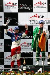 23.11.2008 Kuala Lumpur, Malaysia,  Marco Andretti (USA), driver of A1 Team USA, Adam Carroll (IRL), driver of A1 Team Ireland,  podium - A1GP World Cup of Motorsport 2008/09, Round 3, Sepang, Sunday Race 2 - Copyright A1GP - Free for editorial usage