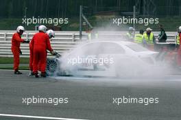 11.04.2008 Hockenheim, Germany,  Susie Stoddart (GBR), Mücke Motorsport AMG Mercedes, AMG Mercedes C-Klasse stopped after the Hairpin Corner with a fire in the front of the car. - DTM 2008 at Hockenheimring