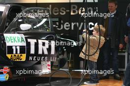 11.04.2008 Hockenheim, Germany,  young photographer takes pitures of Ralf Schumachers(GER), TRILUX AMG Mercedes C-Klasse 2007 - DTM 2008 at Hockenheimring