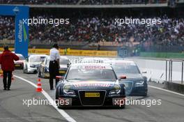 13.04.2008 Hockenheim, Germany,  Race winner Mattias Ekström (SWE), Audi Sport Team Abt Sportsline, Audi A4 DTM, smoking his tyres when driving into the parc ferme together with Timo Scheider (GER), Audi Sport Team Abt, Audi A4 DTM (2nd) and Tom Kristensen (DNK), Audi Sport Team Abt, Audi A4 DTM (3rd) - DTM 2008 at Hockenheimring