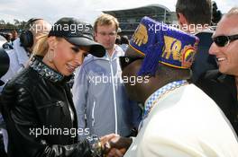 13.04.2008 Hockenheim, Germany,  Cora Schumacher (GER), wife of Ralf Schumacher (GER), on the grid chatting with the King of Benin - DTM 2008 at Hockenheimring