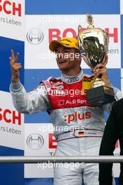 13.04.2008 Hockenheim, Germany,  Podium, Timo Scheider (GER), Audi Sport Team Abt, Portrait (2nd), showing three fingers refering to the 1-2-3 finish of Audi - DTM 2008 at Hockenheimring