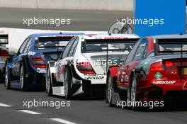 17.05.2008 Klettwitz, Germany,  Cars line up at the exit of the pitlane for the start of the free practice - DTM 2008 at Lausitzring