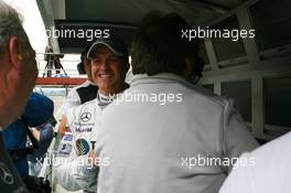 17.05.2008 Klettwitz, Germany,  Norbert Haug (GER), Sporting Director Mercedes-Benz and Ralf Schumacher (GER), Mücke Motorsport AMG Mercedes, Portrait, laughing at the pitwall - DTM 2008 at Lausitzring