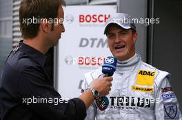 17.05.2008 Klettwitz, Germany,  Ralf Schumacher (GER), Mücke Motorsport AMG Mercedes, Portrait, being interviewed for German TV - DTM 2008 at Lausitzring
