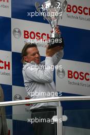 18.05.2008 Klettwitz, Germany,  Podium, Hans-Jürgen Mattheis (GER), Team Manager HWA, with the trophy for the winning constructor - DTM 2008 at Lausitzring