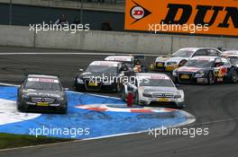 18.05.2008 Klettwitz, Germany,  Start of the race, with Paul di Resta (GBR), Team HWA AMG Mercedes, AMG Mercedes C-Klasse, leading the field into the first corner and a lot of cars running wide - DTM 2008 at Lausitzring